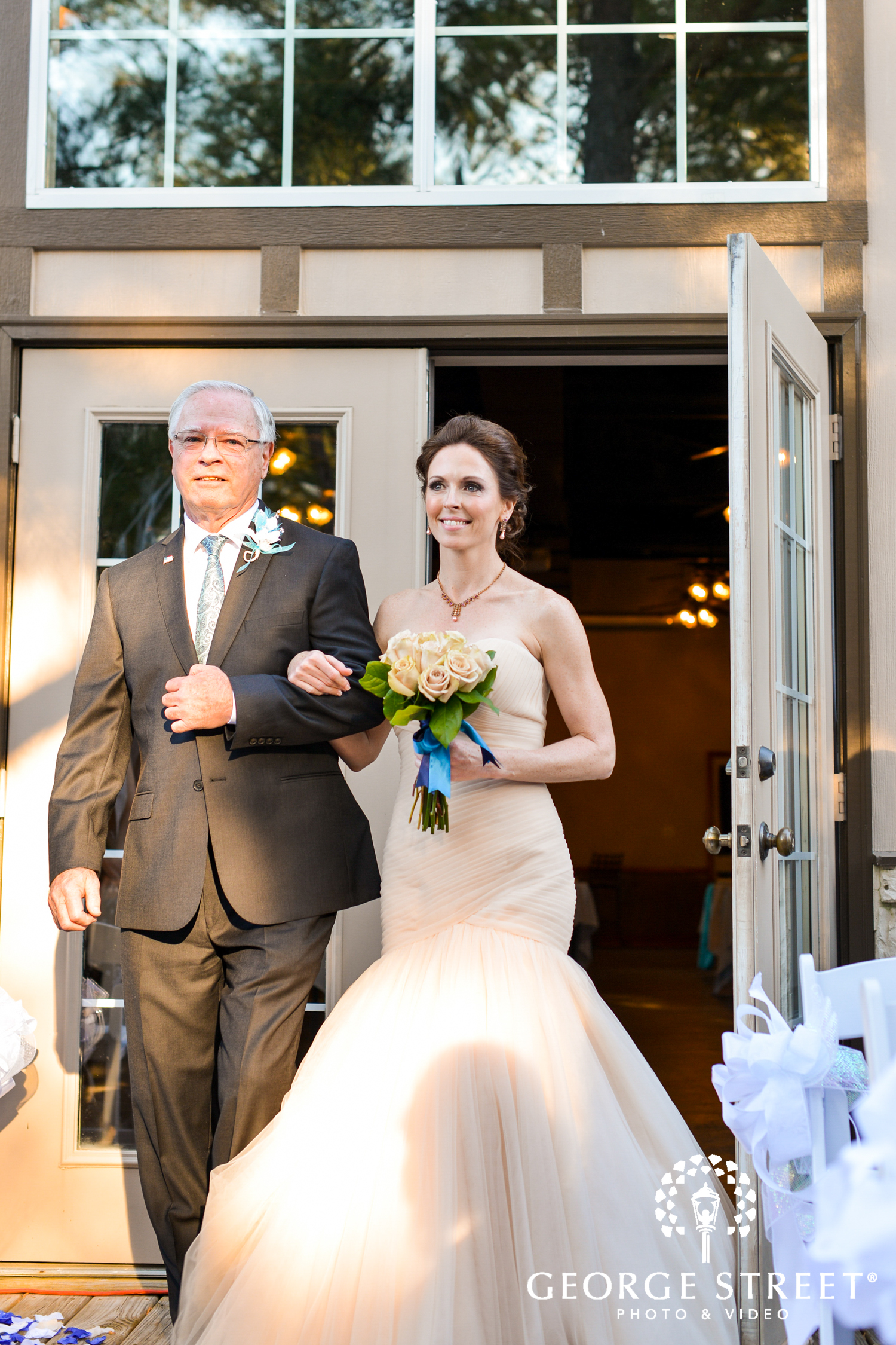 father walking bride down the aisle