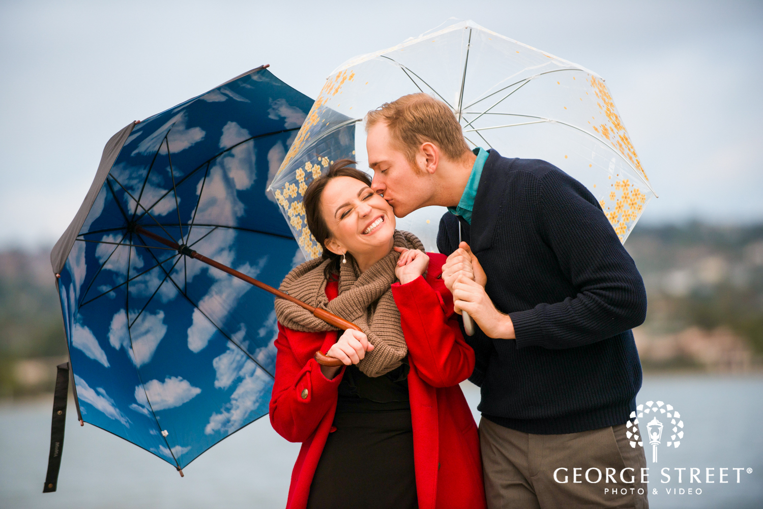 playful engagement photos with umbrellas