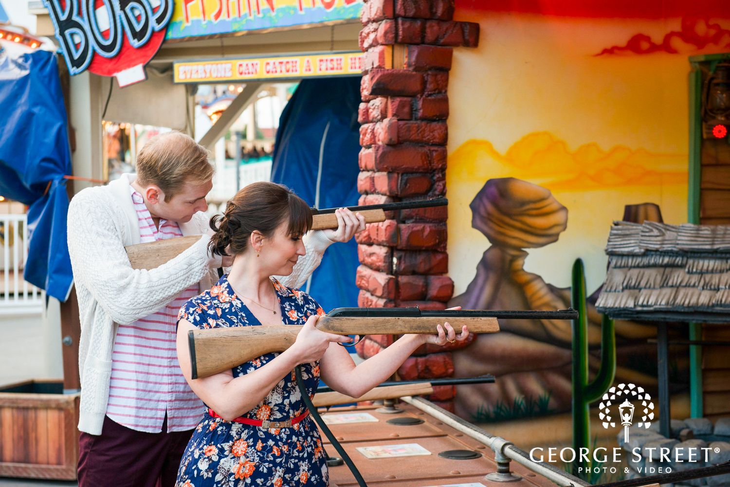 playful amusement park engagement photos