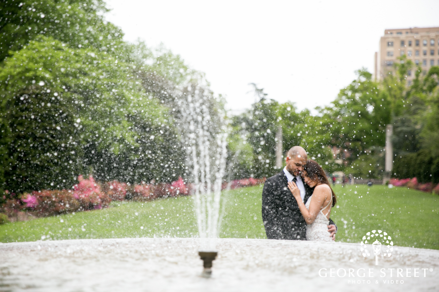 beautiful fountain outdoor new york engagement portraits 