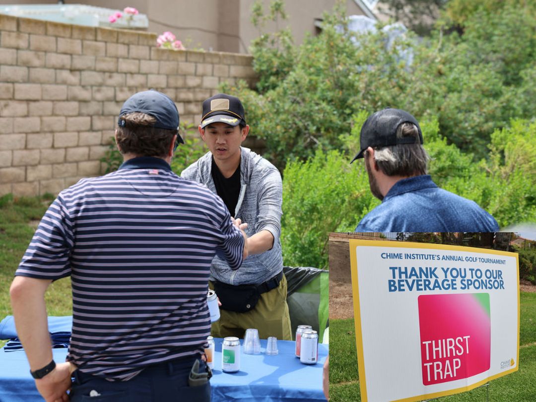 Thirst Trap representative passing out beverages to players