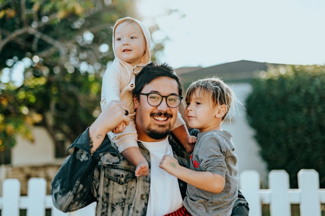 nathan-dumlao-Wr3comVZJxU-unsplash (1).jpg father happy with sons