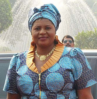 Callista Mutharika appears in a blue patterned dress and headwrap
