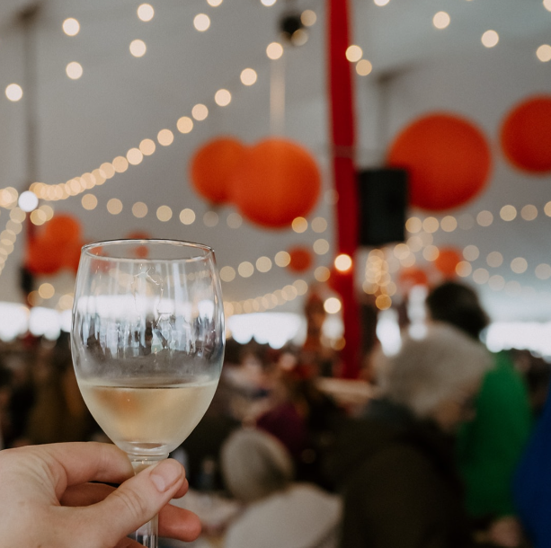 White wine toast in the tent