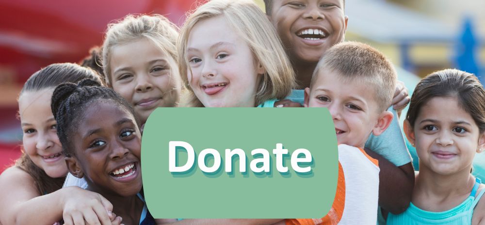 Smiling diverse children with Donate request