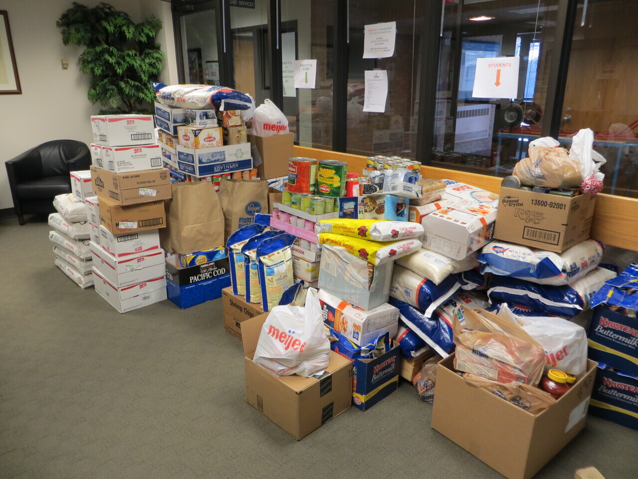 The CEE Giving Games [Building Better Communities, One Can at a Time] logo