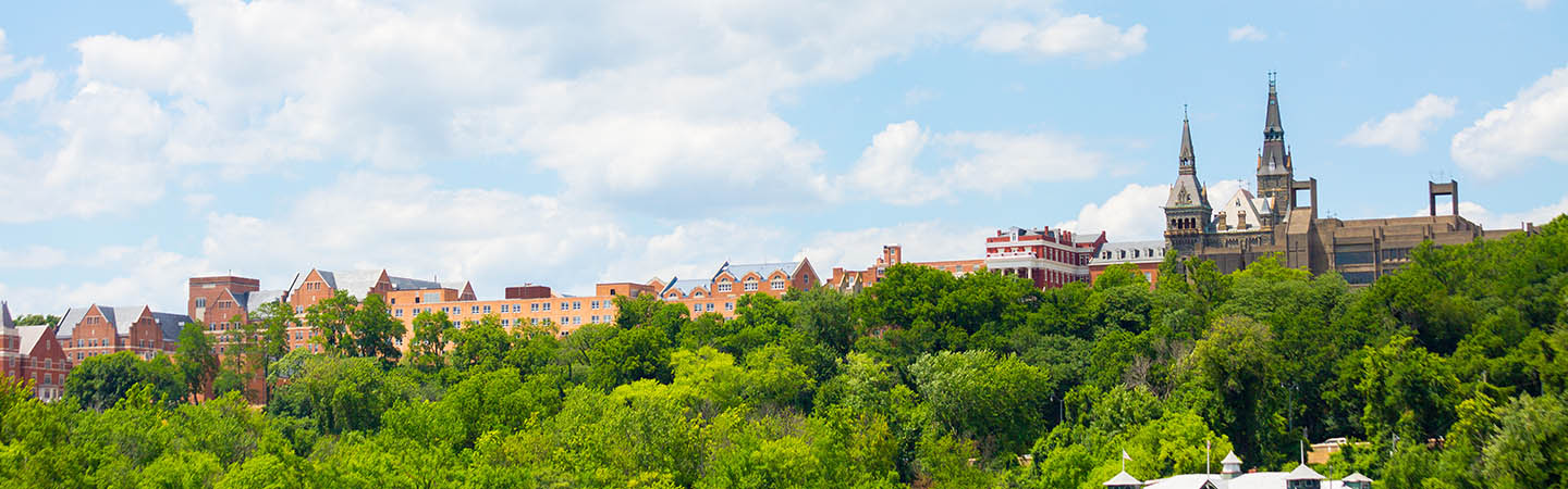 Georgetown University campus skyline viewed from the Key Bridge