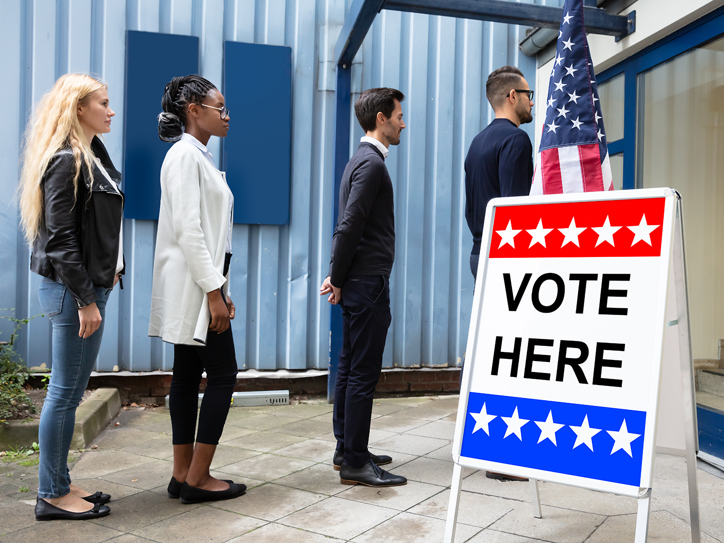 Group Of Young People Standing At The Entrance Of Voting Room