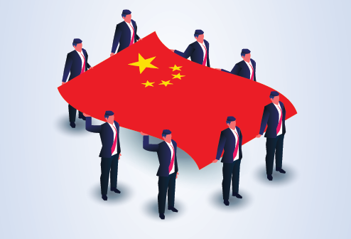 Chinese businessmen and the PRC flag