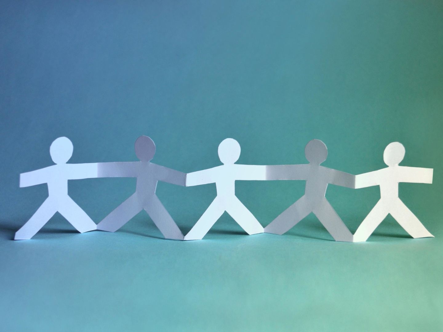 Paper cutout of children.