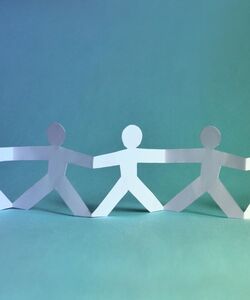 Paper cutout of children.