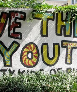 Colorful mural that says "We the Youth"