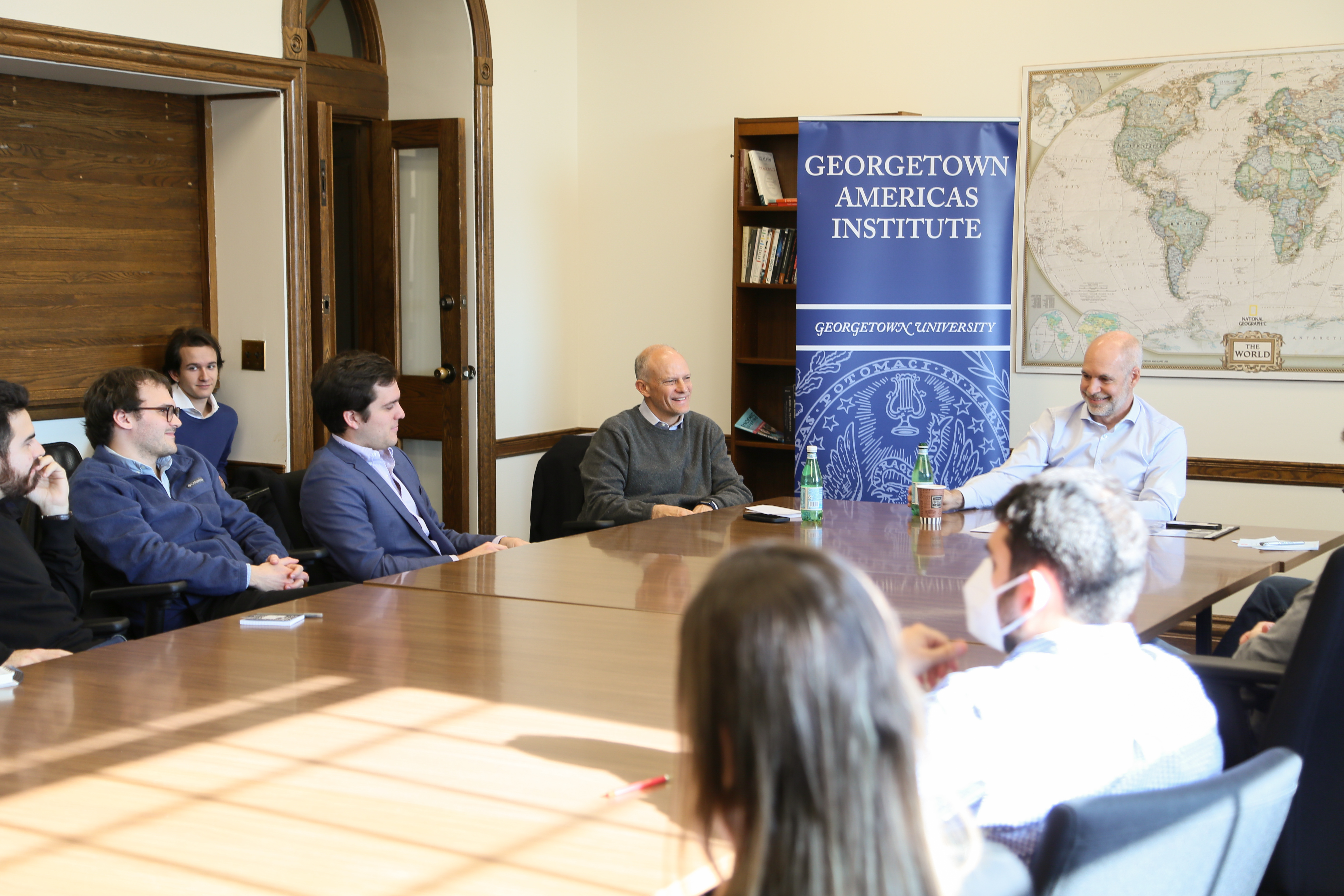 Horacio Rodríguez Larreta speaks with students at Maguire Hall.