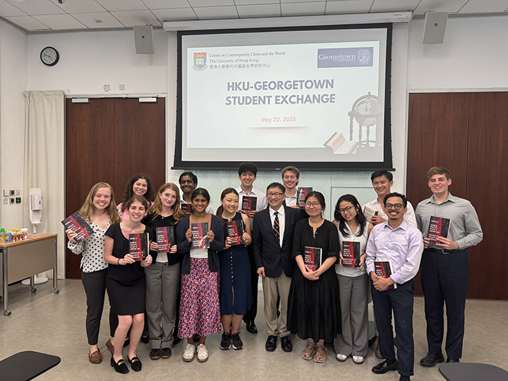 Students receiving Li Cheng's book "Chinese Politics in the Xi Jinping Era" at Hong Kong University
