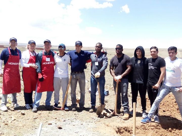 Global Builders and Fuller Center staff, including Carlos Aramayo