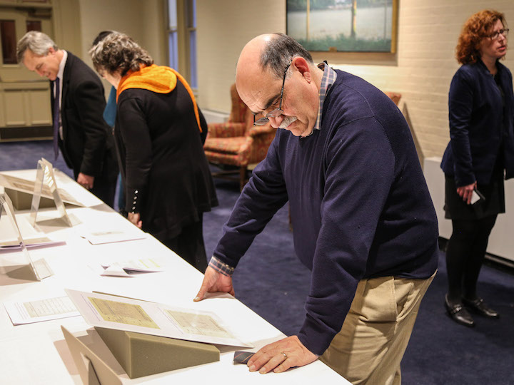 Audience looking at 1918 archives