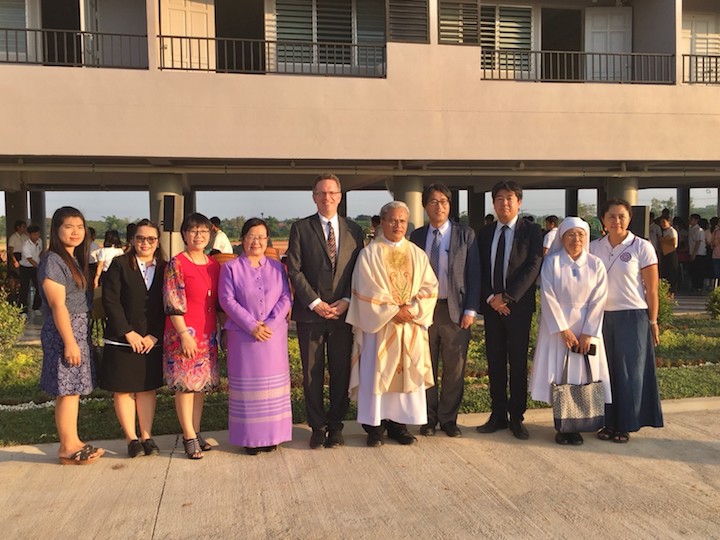 Banchoff and his hosts pose during dedication of new dormitory