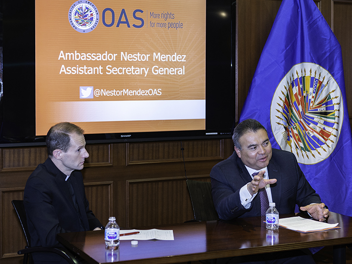 Father Matthew Carnes and Ambassador Nestor Mendez