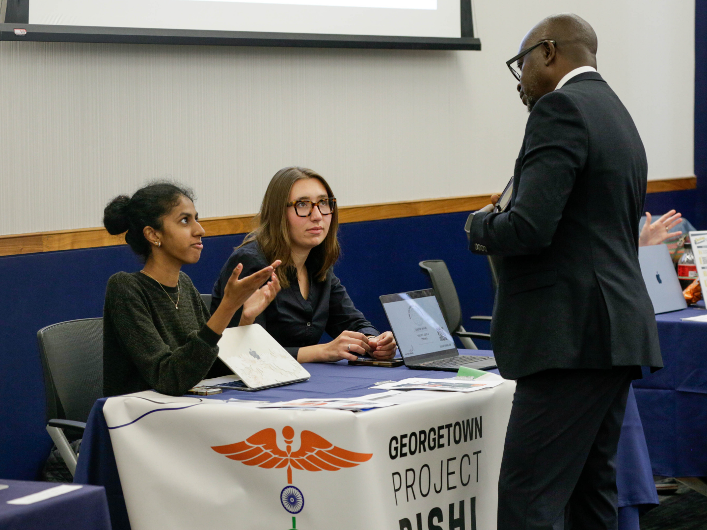 Deus Bazira, director of the Global Health Institute, learns about Project RISHI and Global Health Governance as Public Service.