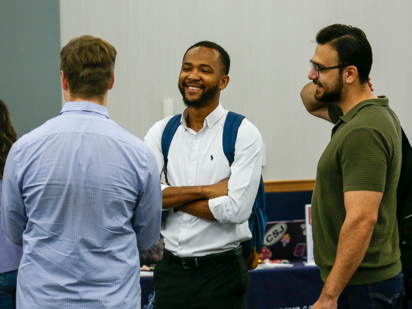 Attendees engage in conversation at the annual Global Health Open House.