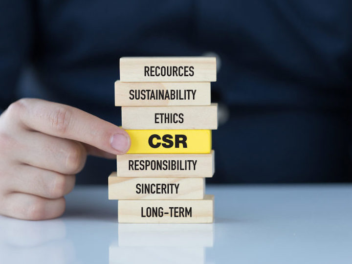 A stack of blocks, each with a word describing a corporate responsibility
