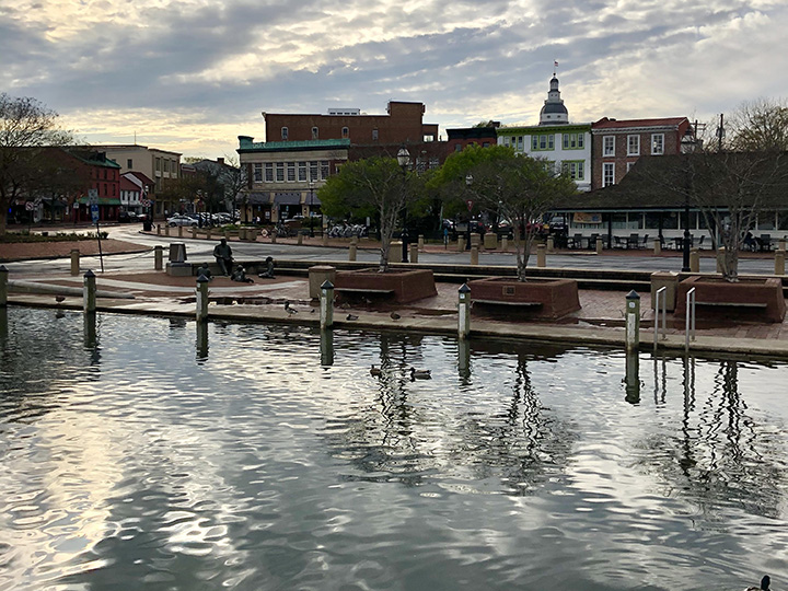 At high tide water almost floods the sidewalk along the Annapolis, Maryland waterfront