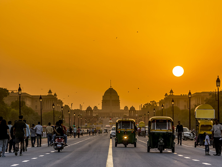 Street in front of India's presidential palace at sunset