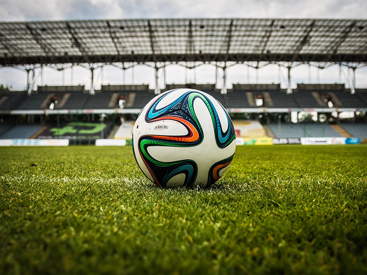 Soccer ball on the field of a stadium