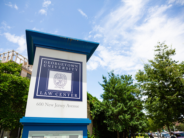 Exterior campus sign: "Georgetown University Law Center, 1600 New Jersey Ave"