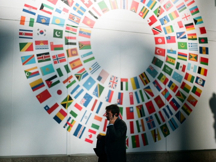 World Bank Interior with Man Speaking on Phone