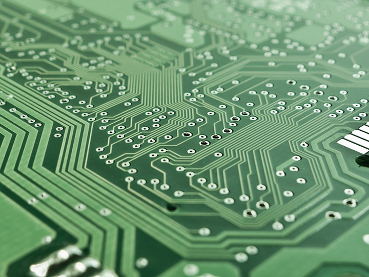 A green computer motherboard.