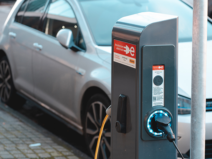 Electric car charging on the street