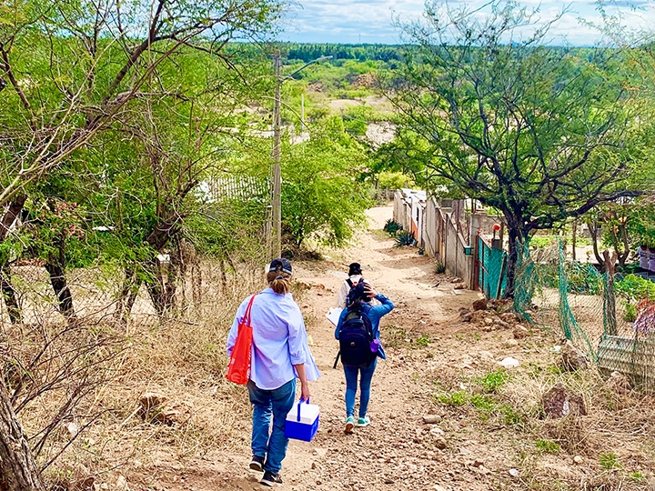 Nursing students walking down a road in Mexico