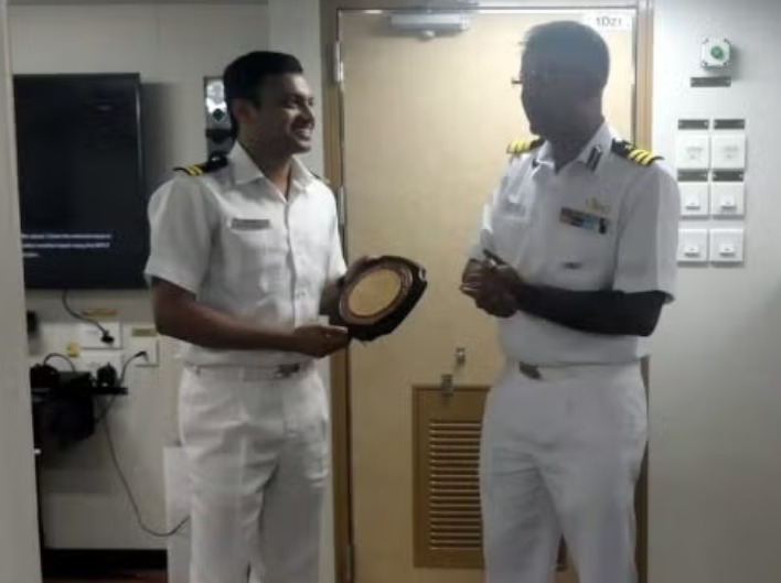 Bhoyar on the final day of his coast guard service with his captain on board the ICGS Veera.