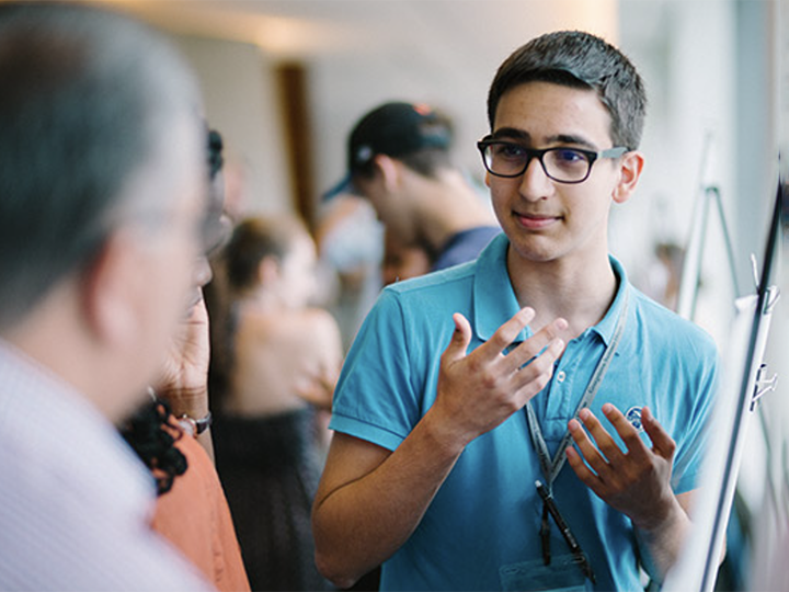 Student presenting at the academy