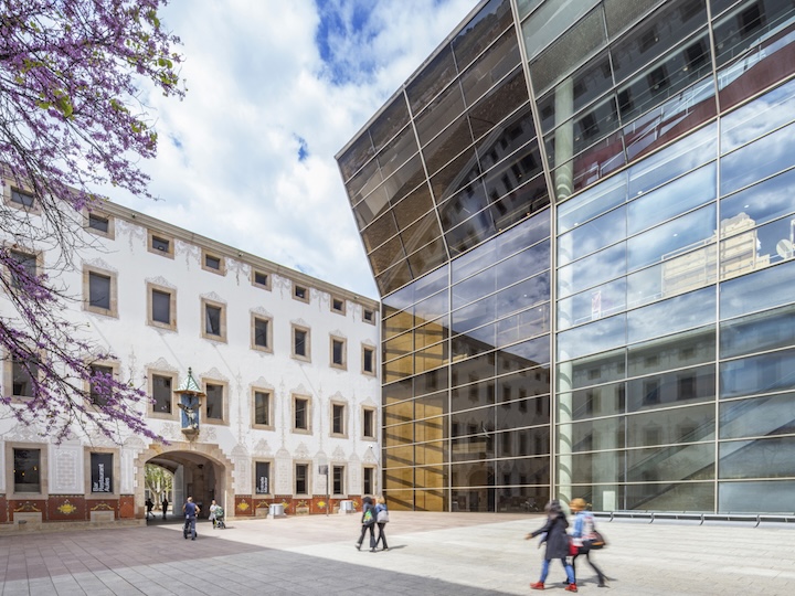 Modern glass exterior of a CCCB building in Barcelona
