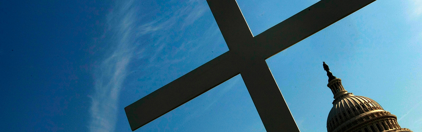 Image of a 16-foot cross planted in front of the U.S. Capitol in Washington, DC