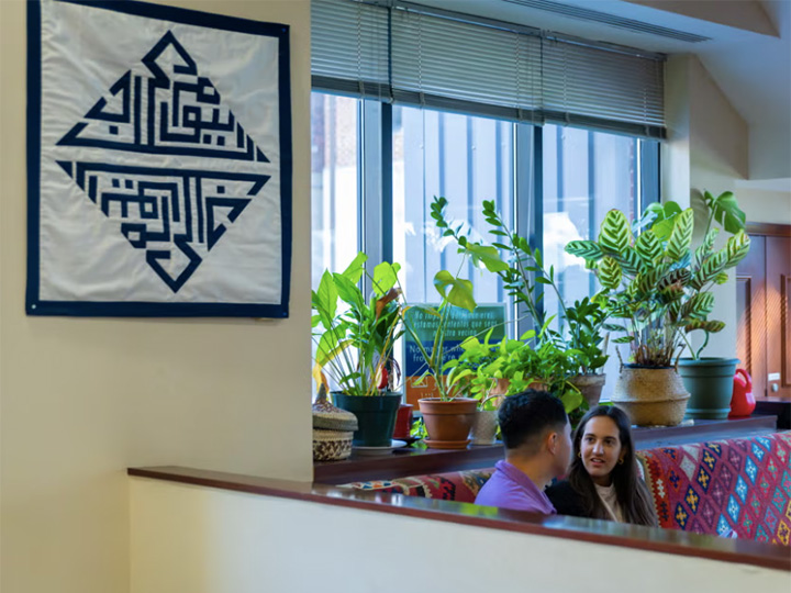 Two students talking in the Center for Contemporary Arab Studies