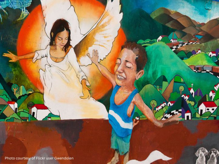 Mural depicting a mother as an angel with her child