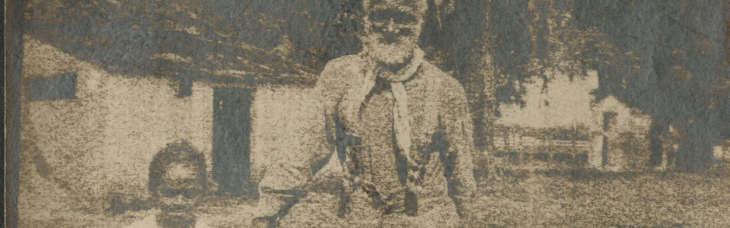 Frank Campbell, a man enslaved by the Maryland Jesuits and sold in 1838, photographed with a child.
