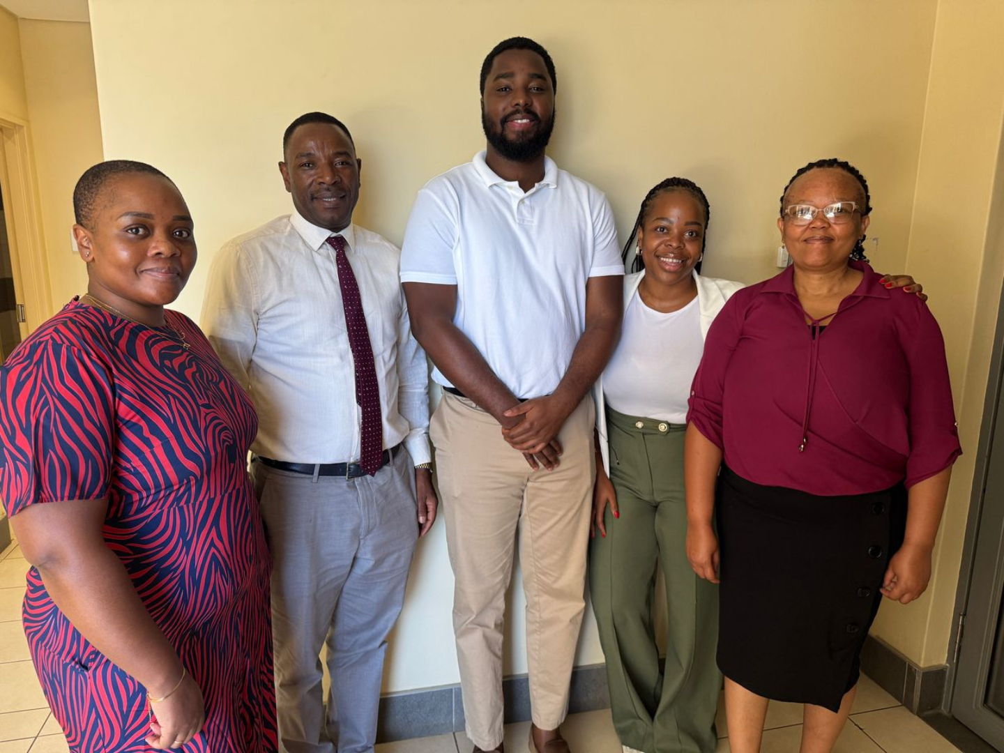Dr. Akyeampong (center) with the Center for Global Health Practice and Impact Eswatini team.