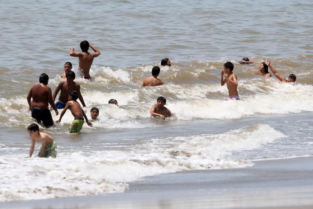Precaución y playa
