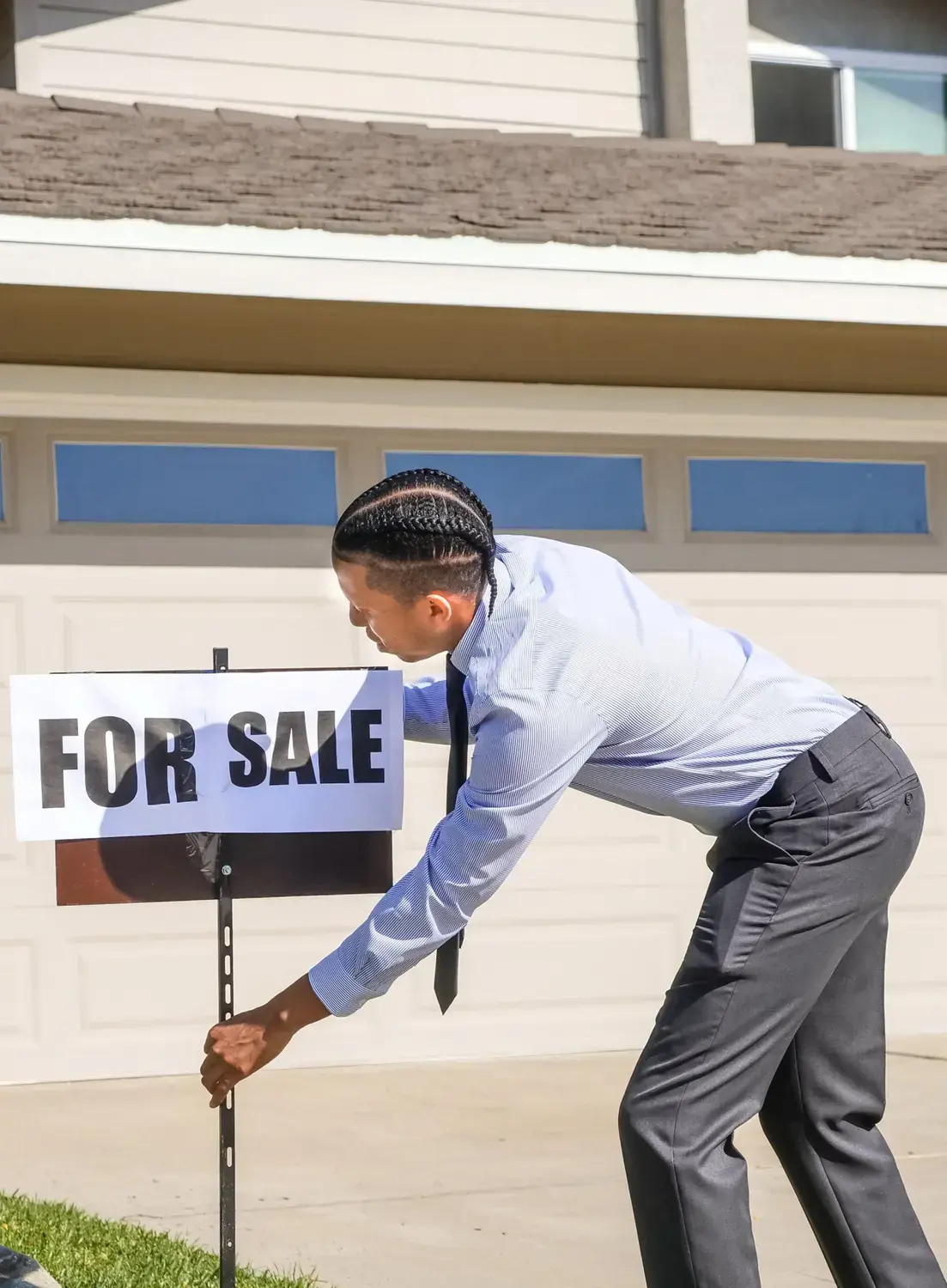 Busy realtor utilizing an answering service for efficient client management.