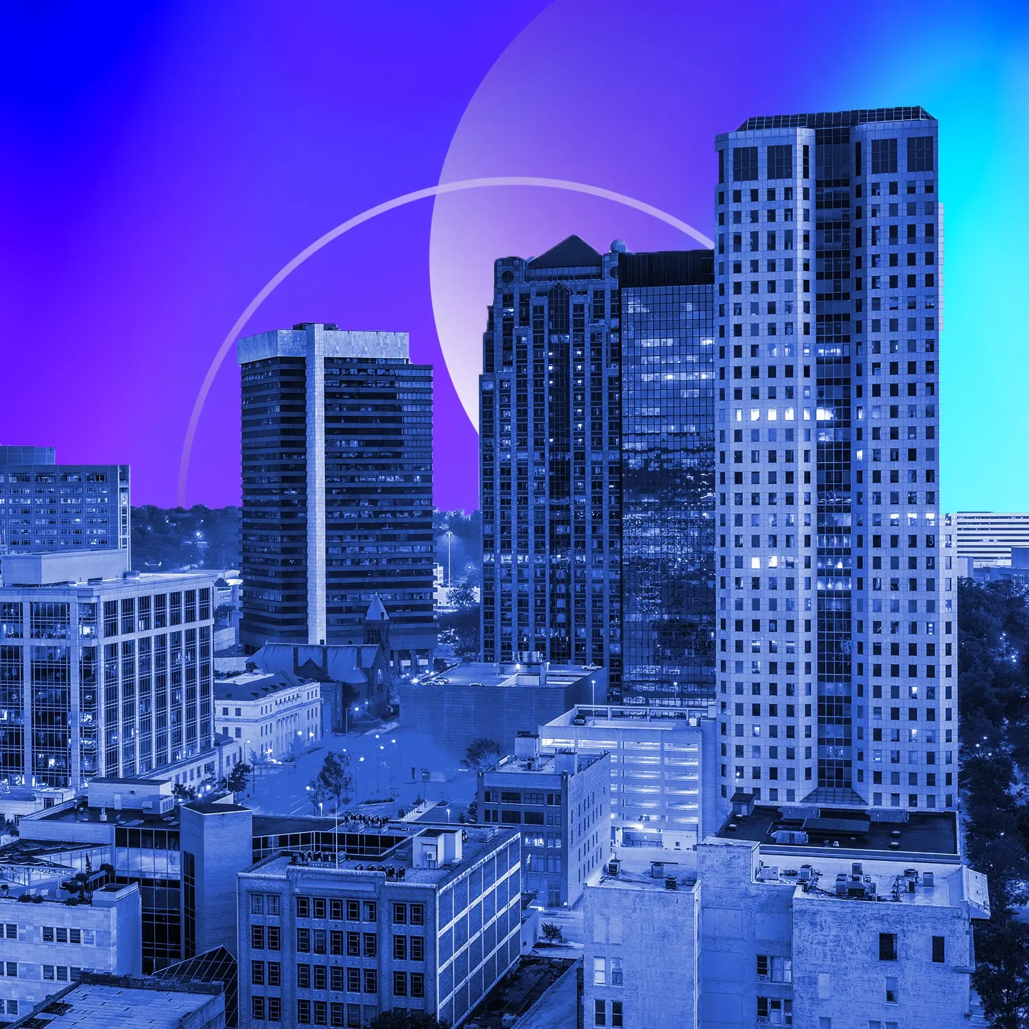 Downtown Birmingham skyline at dusk with purple and teal gradient overlay.