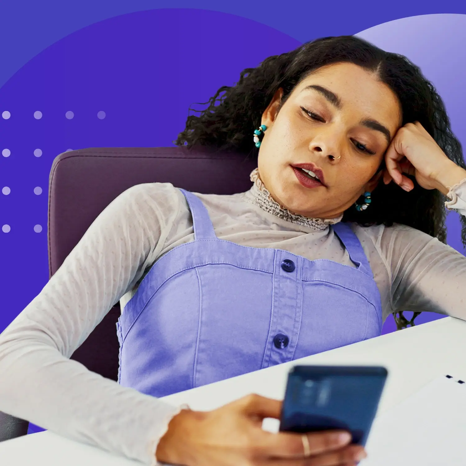 Frustrated customer checking phone at a desk, suggesting missed calls and after-hours customer support gaps.