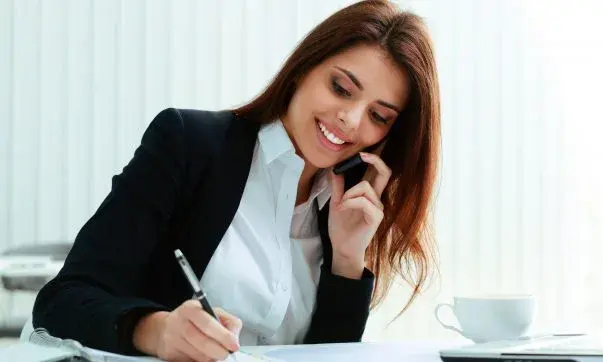 Legal intake virtual receptionist speaking on the phone, assisting clients with inquiries and case intake processes remotely.