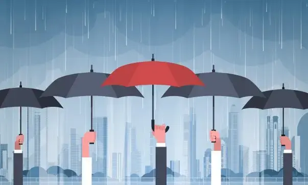 Multiple hands holding up umbrellas