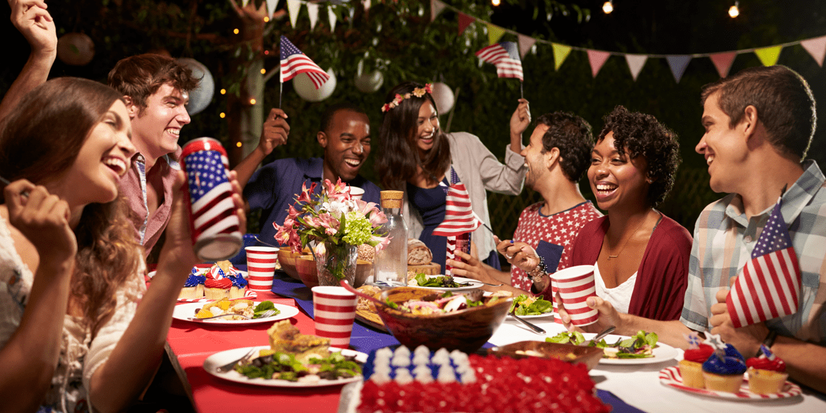 Friends and family gathered at a Fourth of July cookout celebrating America's 250th anniversary