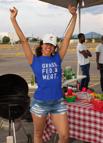 Woman celebrating at a tailgate