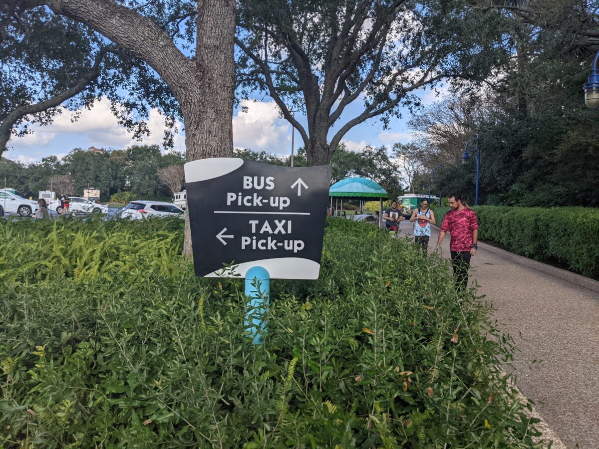 Use the signs for the bus pick-up from SeaWorld theme park to Doubletree by Hilton Orlando